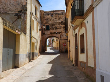 Narrow alley along buildings