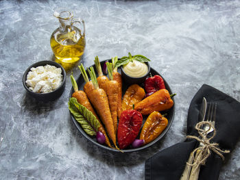 High angle view of fruits in container on table