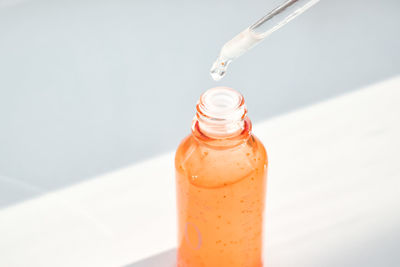 Close-up of water drops on glass bottle