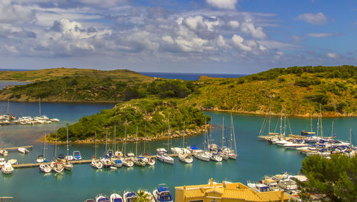 High angle view of moored boats in blue sea