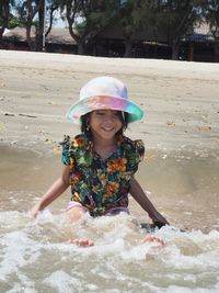 Happy girl smiling woman in water