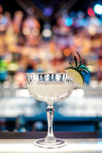 Close-up of wineglass on table