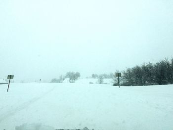 Scenic view of snow covered field