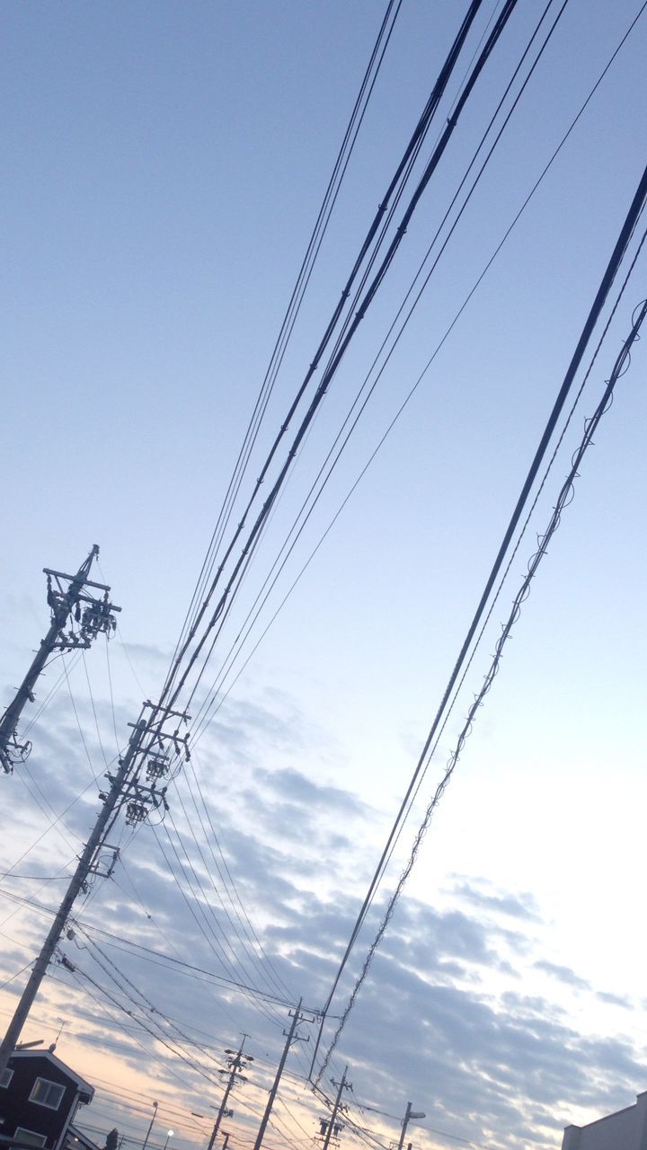 power line, power supply, cable, electricity pylon, low angle view, electricity, connection, fuel and power generation, technology, sky, power cable, clear sky, day, nature, complexity, outdoors, no people, tranquility, blue, telephone pole