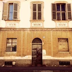 Building exterior with buildings in background