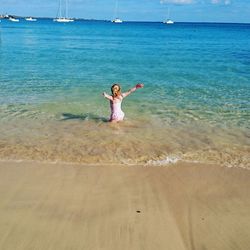 Girl playing in sea