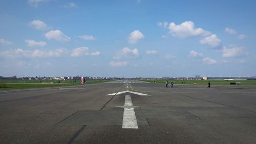 View of airport runway against sky