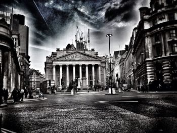 City street against cloudy sky