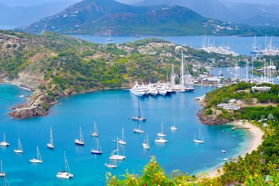 High angle view of boats moored in harbor