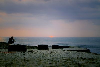 Scenic view of sea against sky during sunset