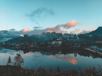 Scenic view of lake against sky during sunset