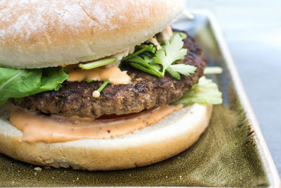 Close-up of burger on table