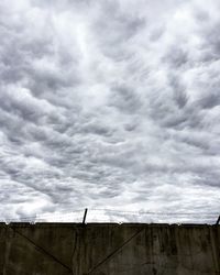 Low angle view of storm clouds against sky