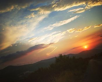 Scenic view of landscape against sky during sunset