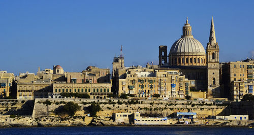 View of buildings against clear sky