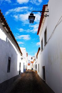 Narrow alley with buildings in background