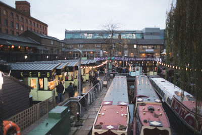 High angle view of street amidst buildings in city