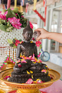 Sculpture of buddha statue outside temple