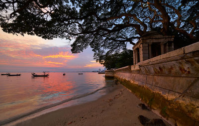 Scenic view of sea against sky at sunset