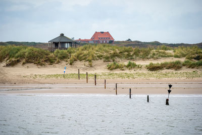 Scenic view of beach against sky