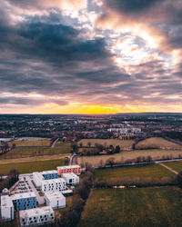 High angle view of townscape against sky during sunset