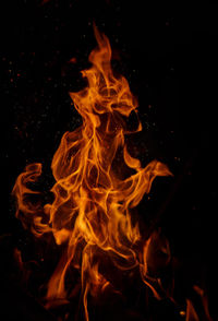 Close-up of bonfire against black background