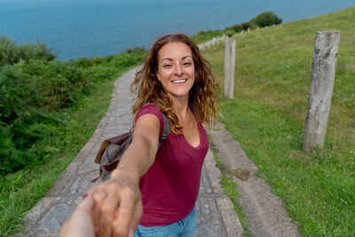 Portrait of smiling young woman