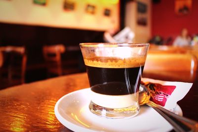 Close-up of coffee cup on table