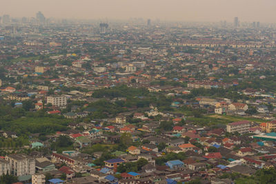 High angle view of illuminated buildings in city