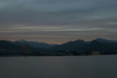 Scenic view of mountains against sky at sunset