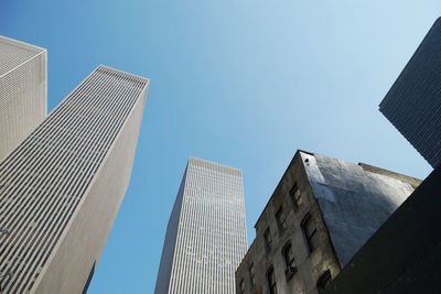 Low angle view of modern building against clear sky