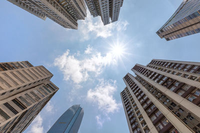 Low angle view of buildings against sky in city