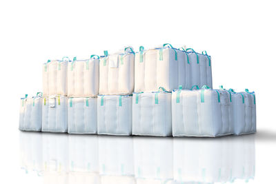 Close-up of bottles against white background