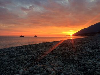 Scenic view of sea against sky during sunset