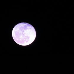 Low angle view of full moon in sky