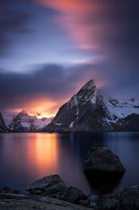 Scenic view of lake against sky during sunset