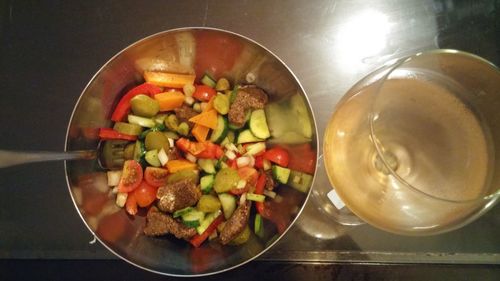 High angle view of fruit salad in bowl on table