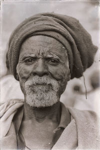 Close-up portrait of man wearing sunglasses