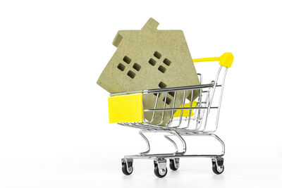 Close-up of yellow objects over white background
