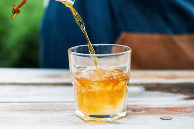 Cold coffee tonic. coffee is poured into a glass with tonic and ice.