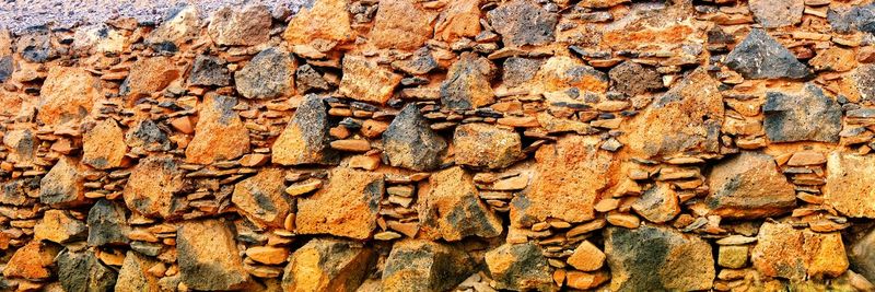 Panoramic view of stone wall