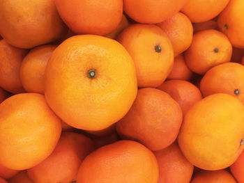 Full frame shot of oranges in market