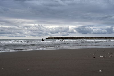 Scenic view of beach against sky