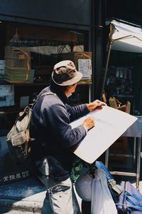 Man holding umbrella