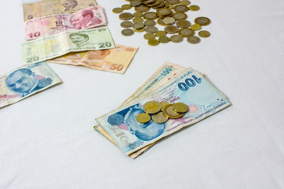 High angle view of coins on table