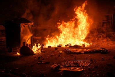 Panoramic view of fire on display at night