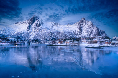 Scenic view of snowcapped mountains against sky