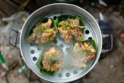 High angle view of seafood in container on table
