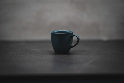 Close-up of coffee cup on table