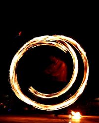 Close-up of fire against black background